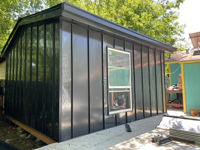 Black standing seam metal wall panels for Roof Inspection in Fountain Inn